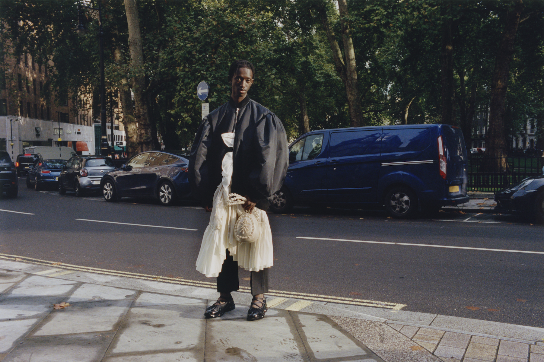 Boy on London street wearing Simone Rocha menswear