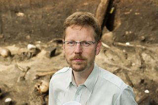 Lead Archaeologist, bone desecration
