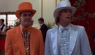 Dumb and Dumber Harry and Lloyd stand in their odd colored tuxes, admiring the ladies