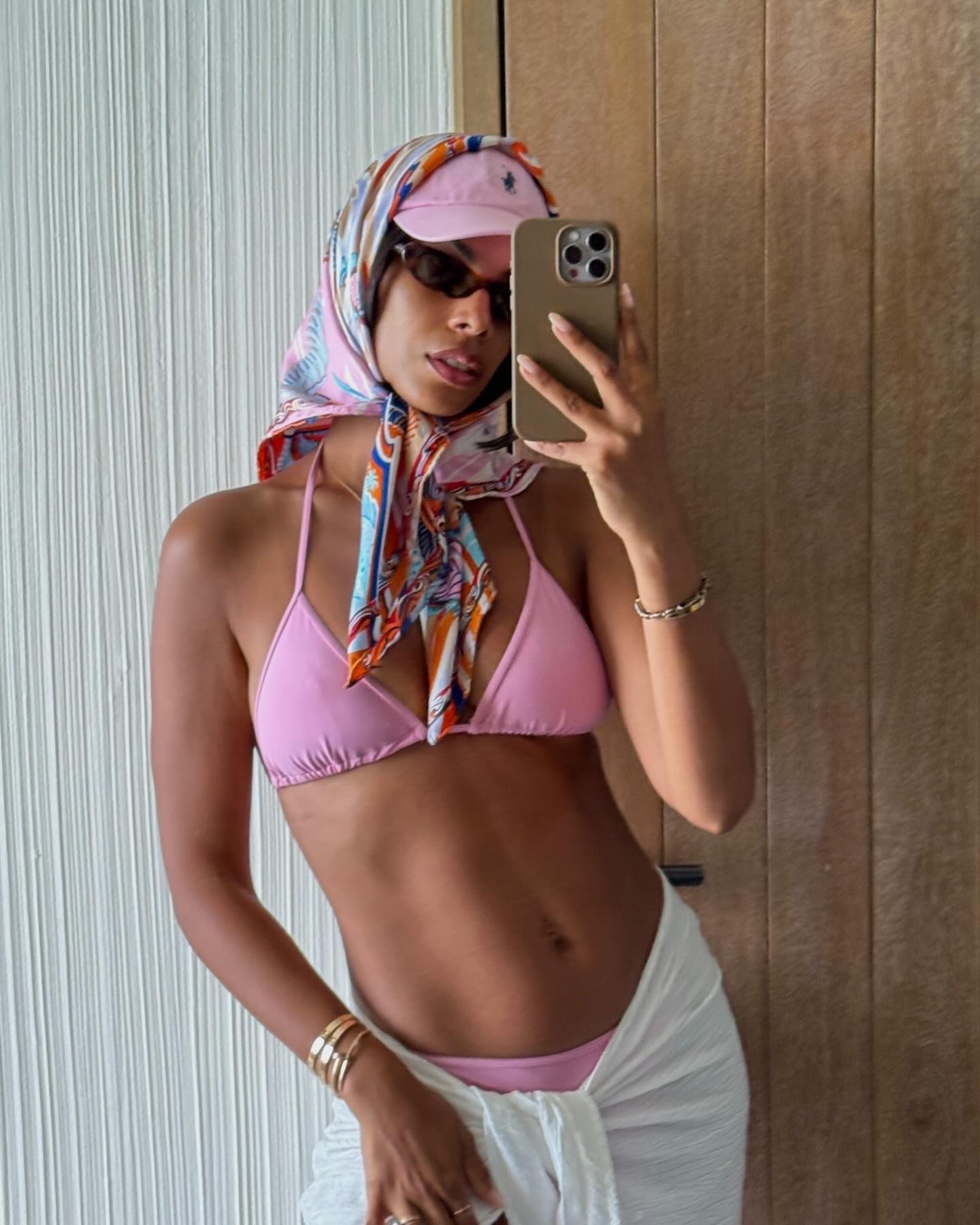Rochelle Humes taking a mirror selfie with a subtle, blurred French manicure nail design