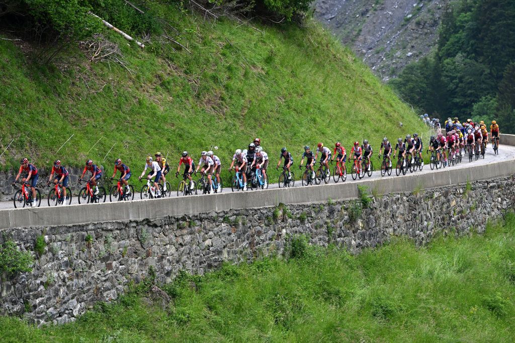 COL DE LA CROIX DE FER FRANCE JUNE 10 A general view of the peloton competing during the 75th Criterium du Dauphine 2023 Stage 7 a 1479km stage from PortedeSavoie to Col de la Croix de Fer 2067m UCIWT on June 10 2023 in Col de la Croix de Fer France Photo by Dario BelingheriGetty Images