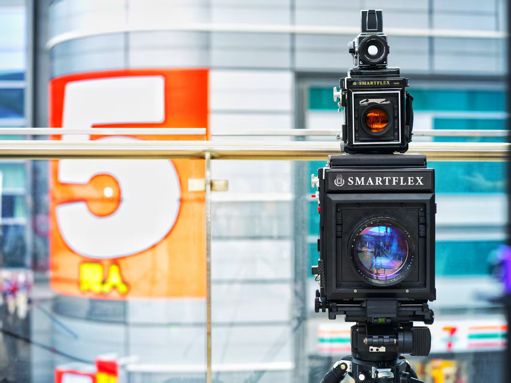 The Smartflex 8x10 SLR is a large-format film camera with a viewfinder and SLR design