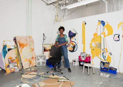 a black women in her art studio