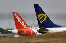 EasyJet and Ryanair aircraft sit on the tarmac in Humberto Delgado International Airport on June 03, 2022 in Lisbon, Portugal. 