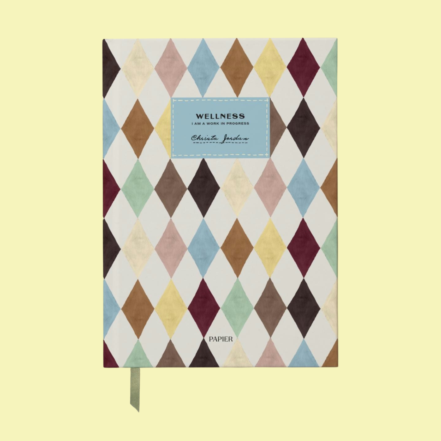A harlequin-style wellness journal