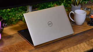 A Dell XPS 15 (2022) on a wooden desk