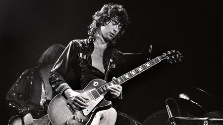 Jimmy Page performing on stage at the Seattle Coliseum 