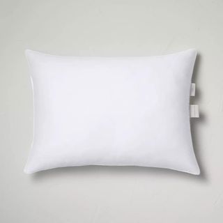 Medium Down Alternative Pillow against a cream background.