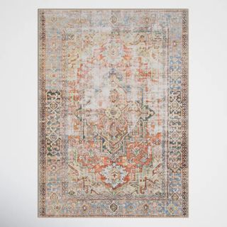 Oriental vintage style rug, rectangular in shape, weatherd style and muted colours