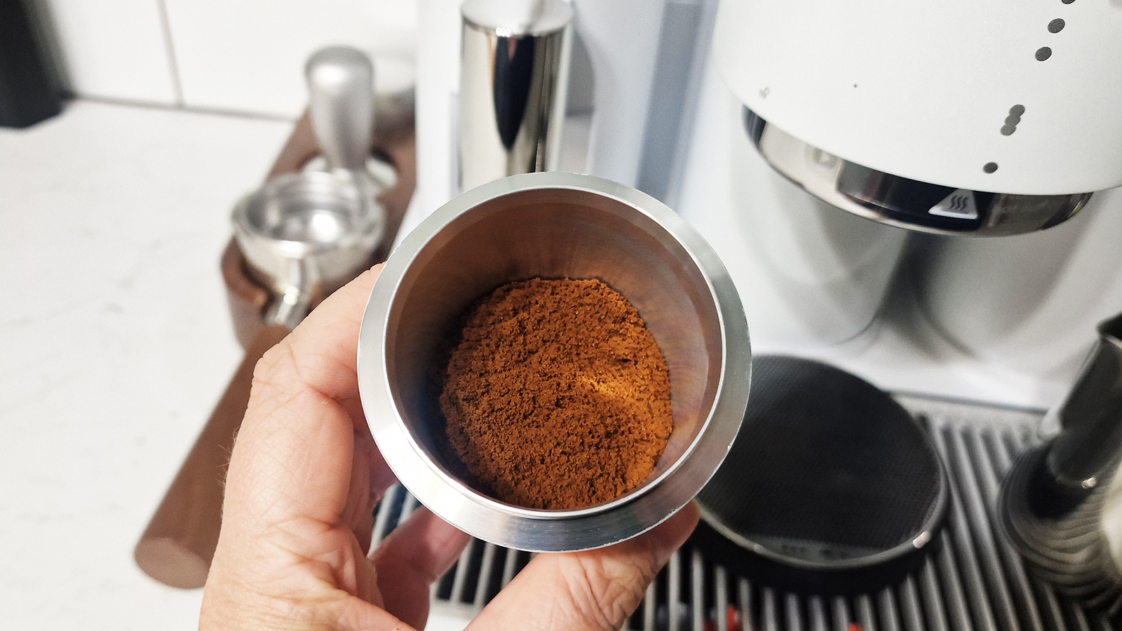 Ground coffee in the Meraki espresso machine