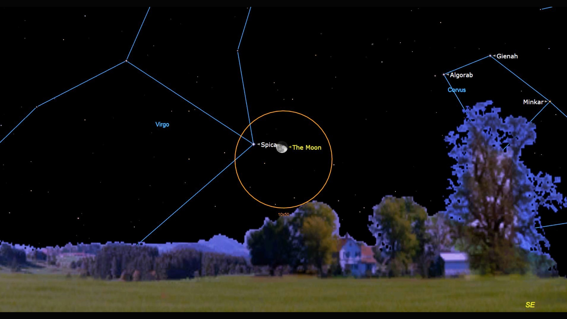 A map of the night sky overlooking a field with trees to the right of the image. In the center, a small orange circle encloses labeled dots for the star Spica and an icon of the moon near each other