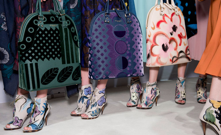 Bags and high-heeled shoes with bold geometric and floral patterns