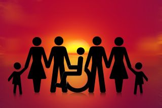 Illustration: Family rendered in silhouette against sunrise includes person in wheelchair