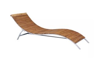A modern curved wood sun lounger