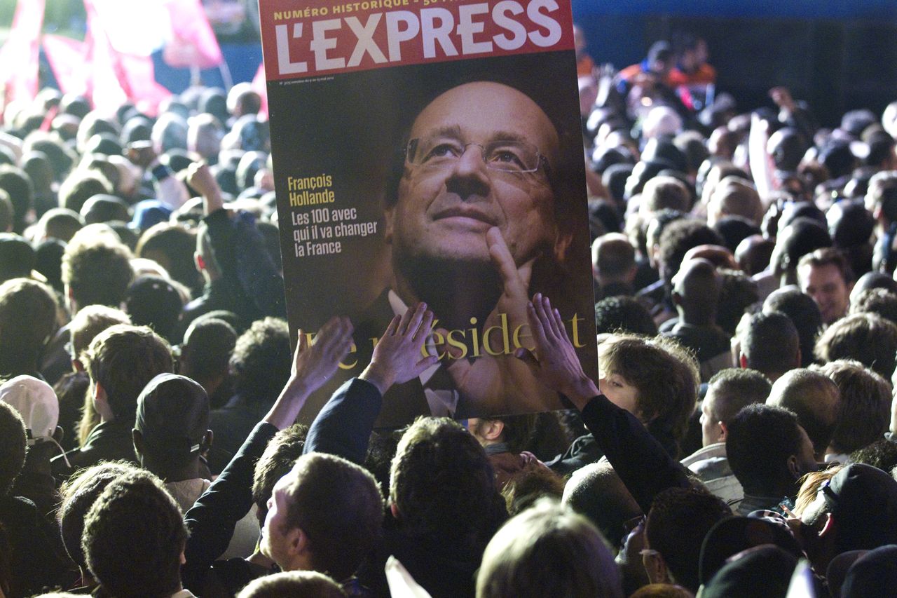 Francois Hollande supporters cheer.