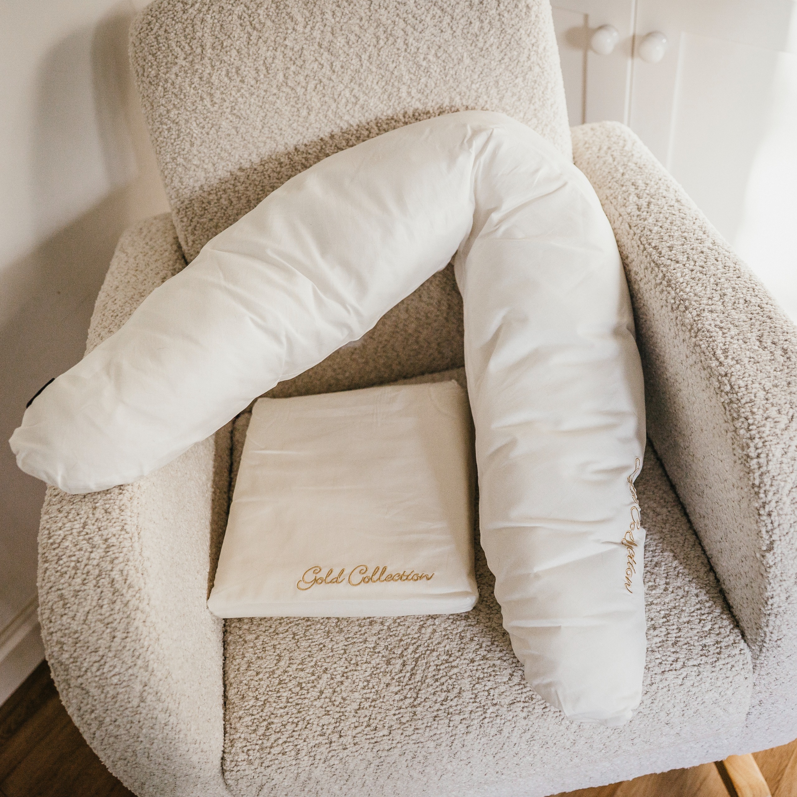 A close-up of the CuddleCo nursing pillow set