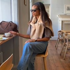 Fashion person wearing a COS sweater