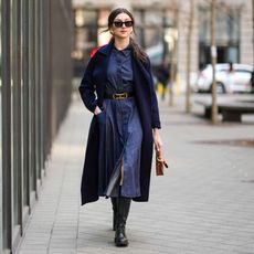 Woman in a denim midi dress GettyImages-2011584064