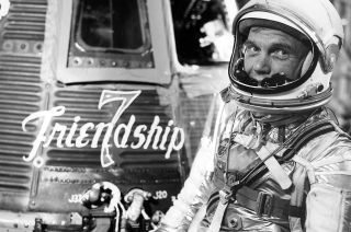 John Glenn, seen sitting beside his Friendship 7 Mercury capsule before his historic flight in 1962, died on Dec. 8, 2016.