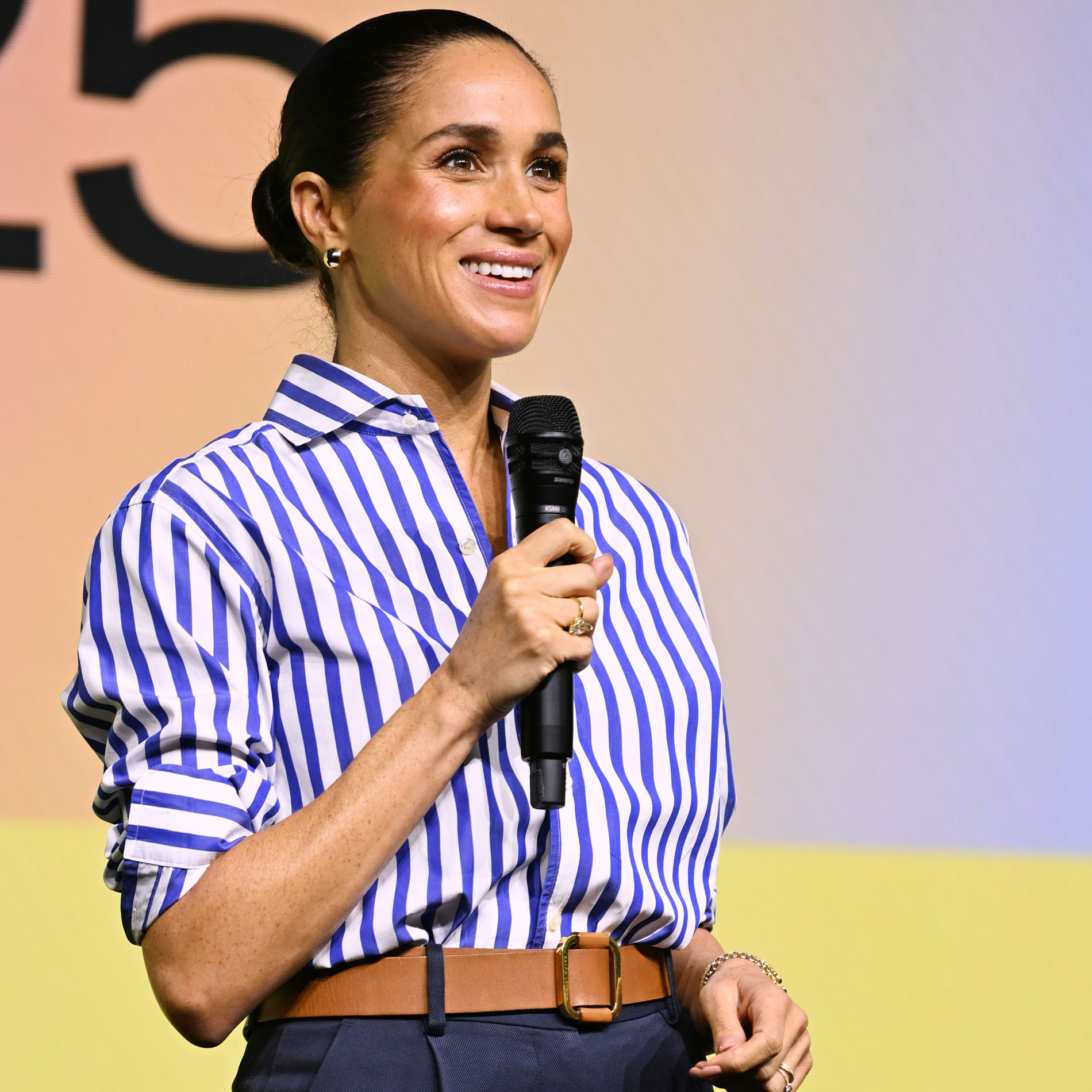 Meghan Markle wears a blue striped shirt in October 2025