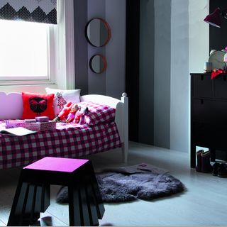 kids room with black and grey wall