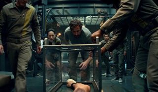 The Cloverfield Paradox Gordon amazed that his arm has been trapped