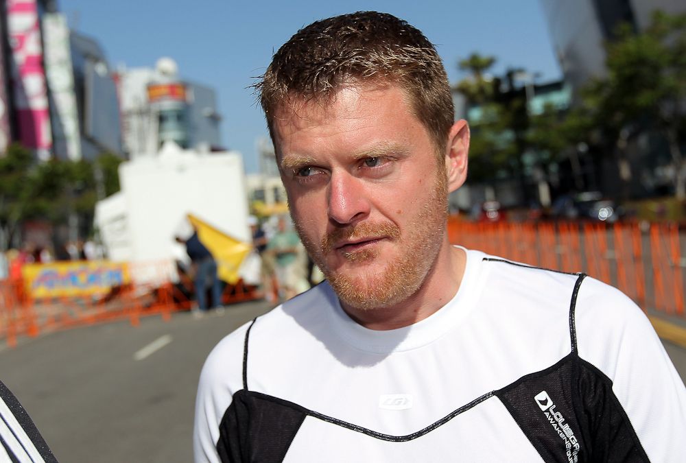 Floyd Landis looks on as he attends Stage Seven of the 2010 Tour of California