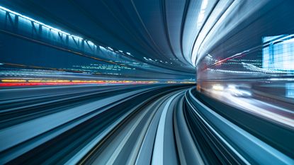 A train track in a tunnel.