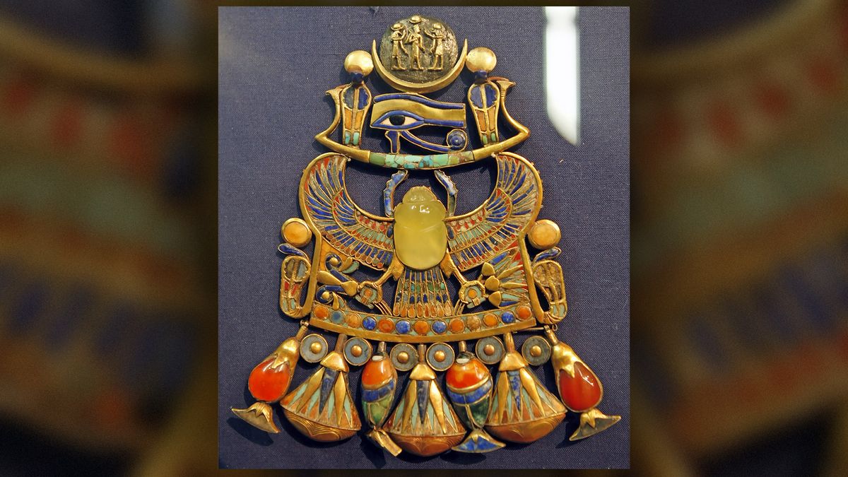 King Tut&#039;s tomb included an artifact called a pectoral, which incorporated a piece of Libyan Desert Glass as the scarab beetle at its center.