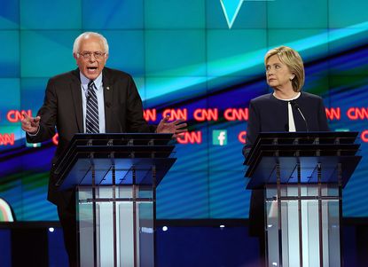Democratic presidential candidates Hillary Clinton and Bernie Sanders at the first debate in Las Vegas