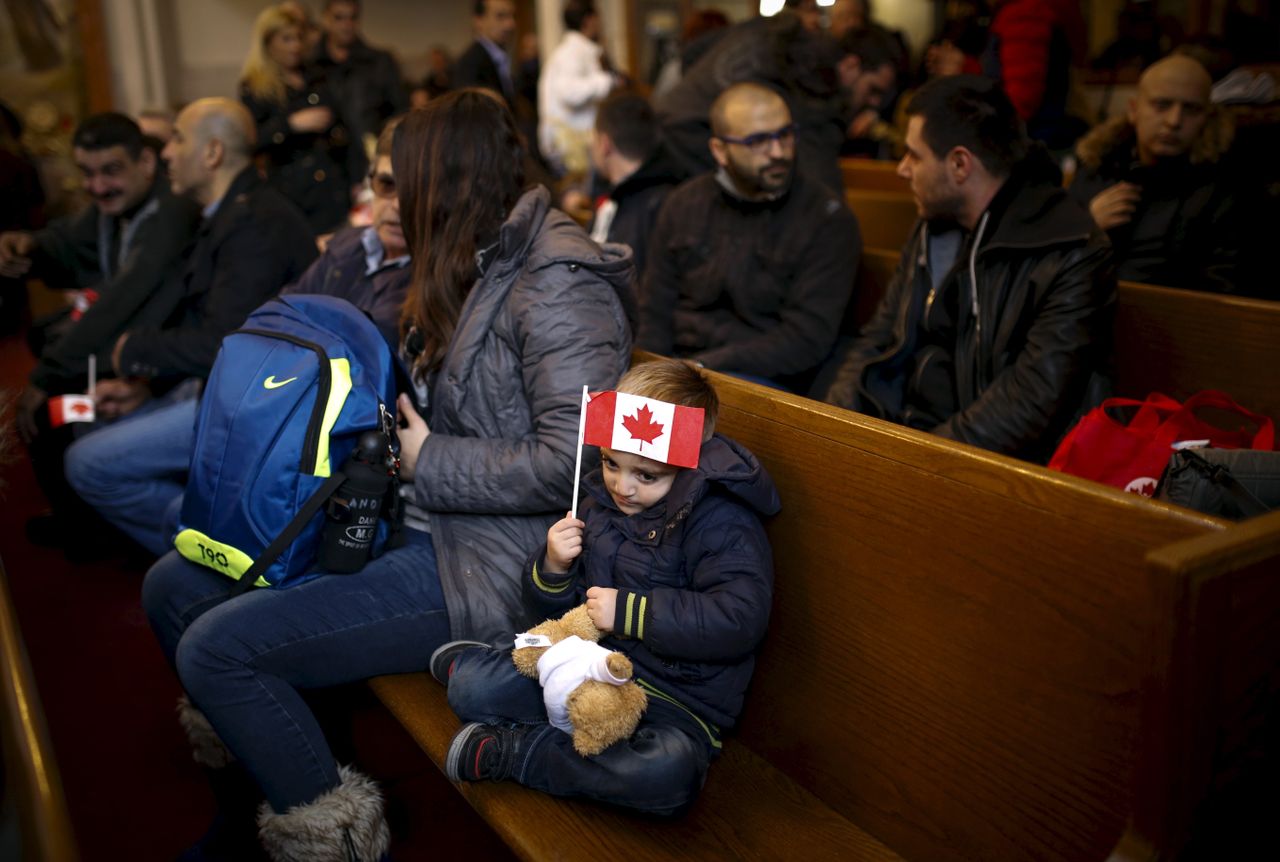 Welcoming refugees into Canada.