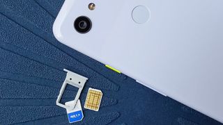 Visible SIM card next to Pixel 3a