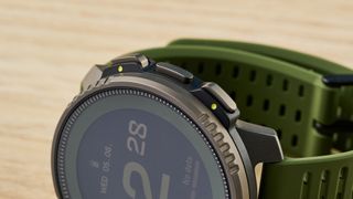 an outdoor-style smartwatch with a big screen and titanium bezel case with a forest green strap