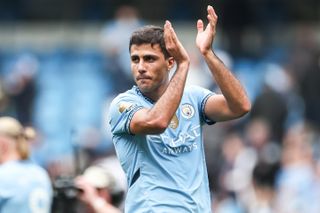 Rodri of Manchester City applauds the fans after the Premier League match against Brentford, September 2024