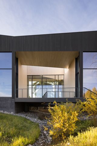 exterior detail looking in at this jackson hole retreat in wyoming