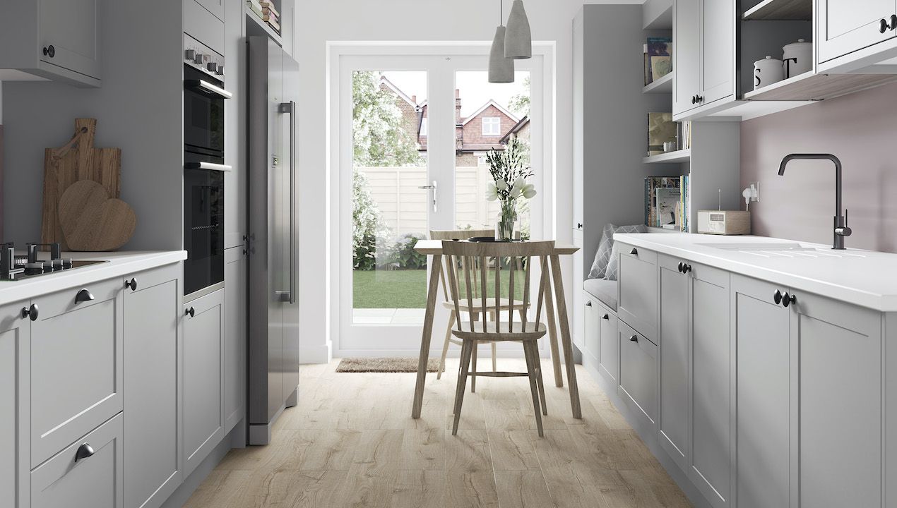 small grey kitchen with shaker cabinets