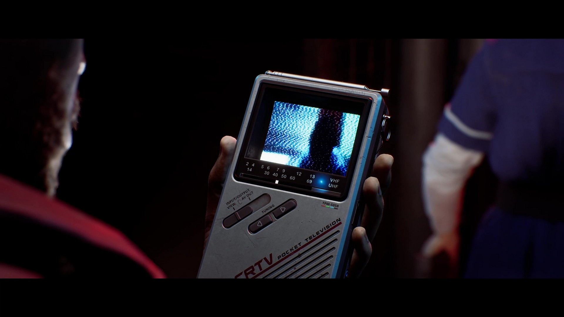 Looking at a video on the CRTV in Silent Hill Townfall