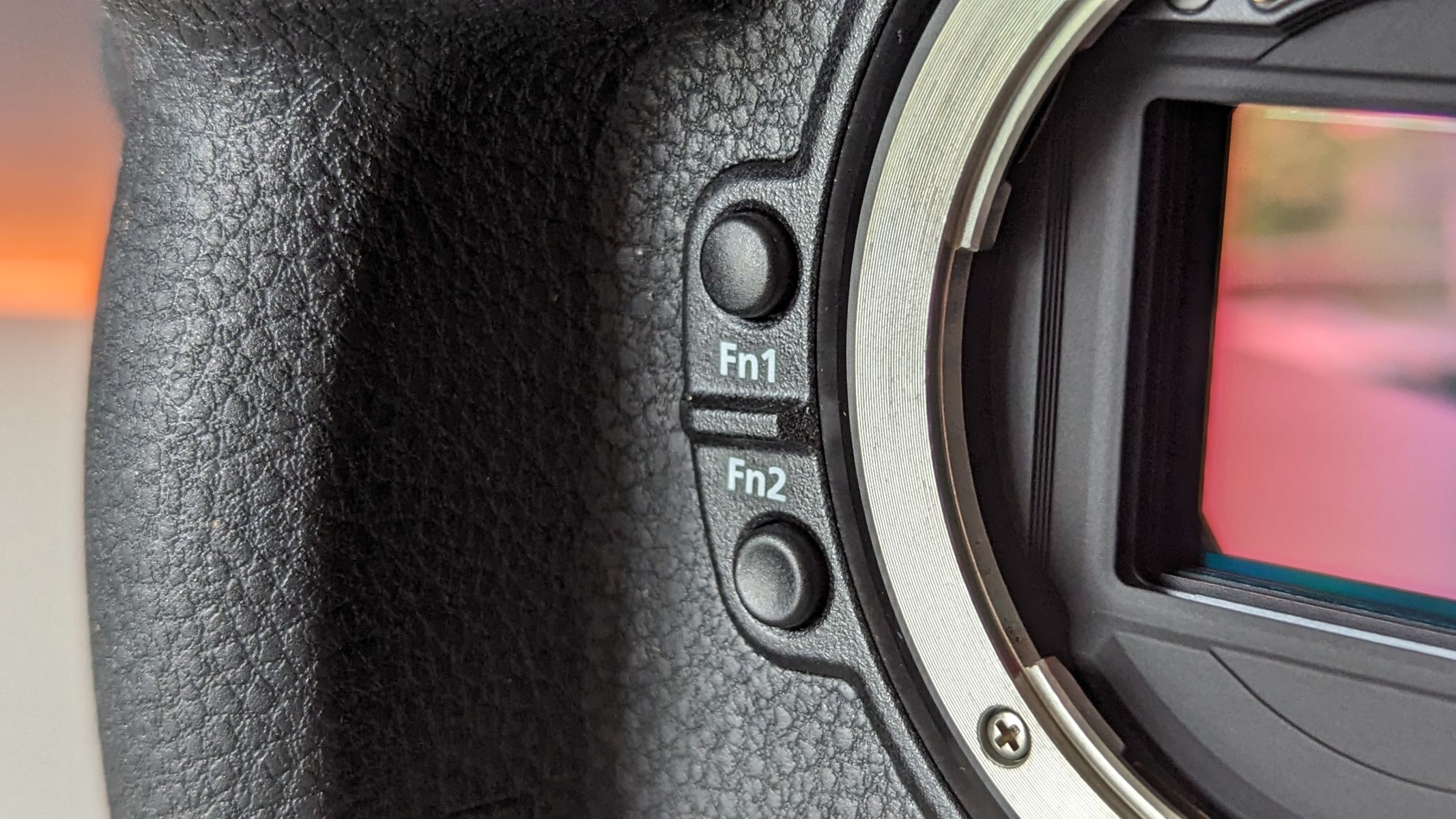 Close-up of the Nikon Z8 function buttons by the lens