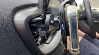 ESR Qi2 15W MagSafe Car Charger attached to car dashboard