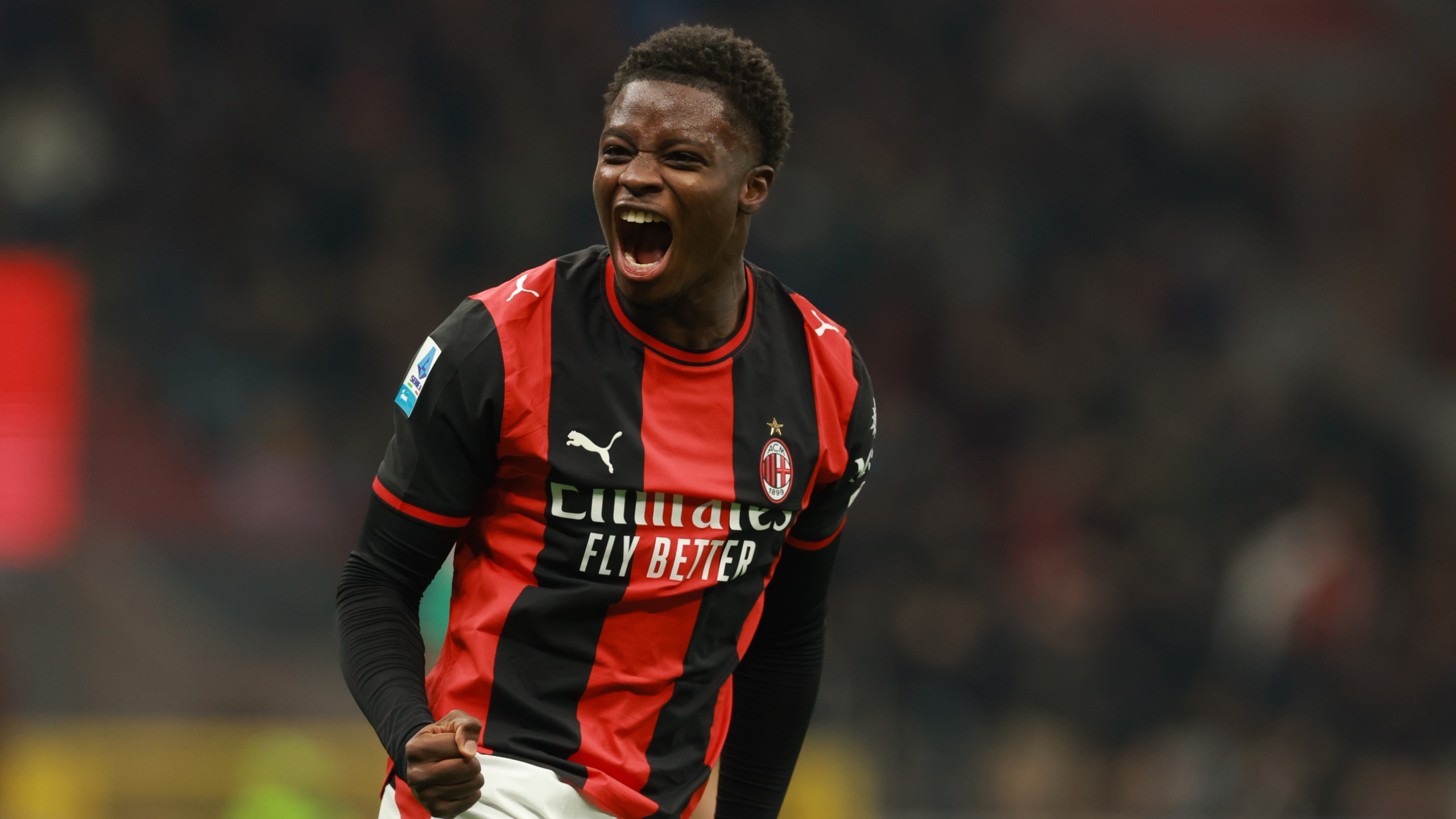 Alphadjo Cisse of AC Milan celebrates after scoring the goal during the Serie A match between AC Milan and Bologna FC at Stadio Giuseppe Meazza on October 28, 2026 in Milan, Italy.