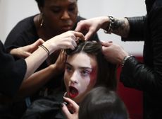 A model gets prepped for the runway. 