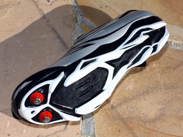 Woo hoo! Riders who love the heat-moldable custom fit and durability of Shimano's current top-end mountain bike shoe can now finally treat themselves to reasonable traction when on foot, too.