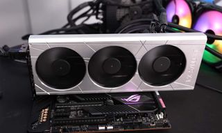 A picture of der8auer's modded RX 5700 XT with custom shroud and Noctua fans.