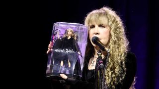 Stevie Nicks onstage at Madison Square Garden with Barbie Doll in her likeness