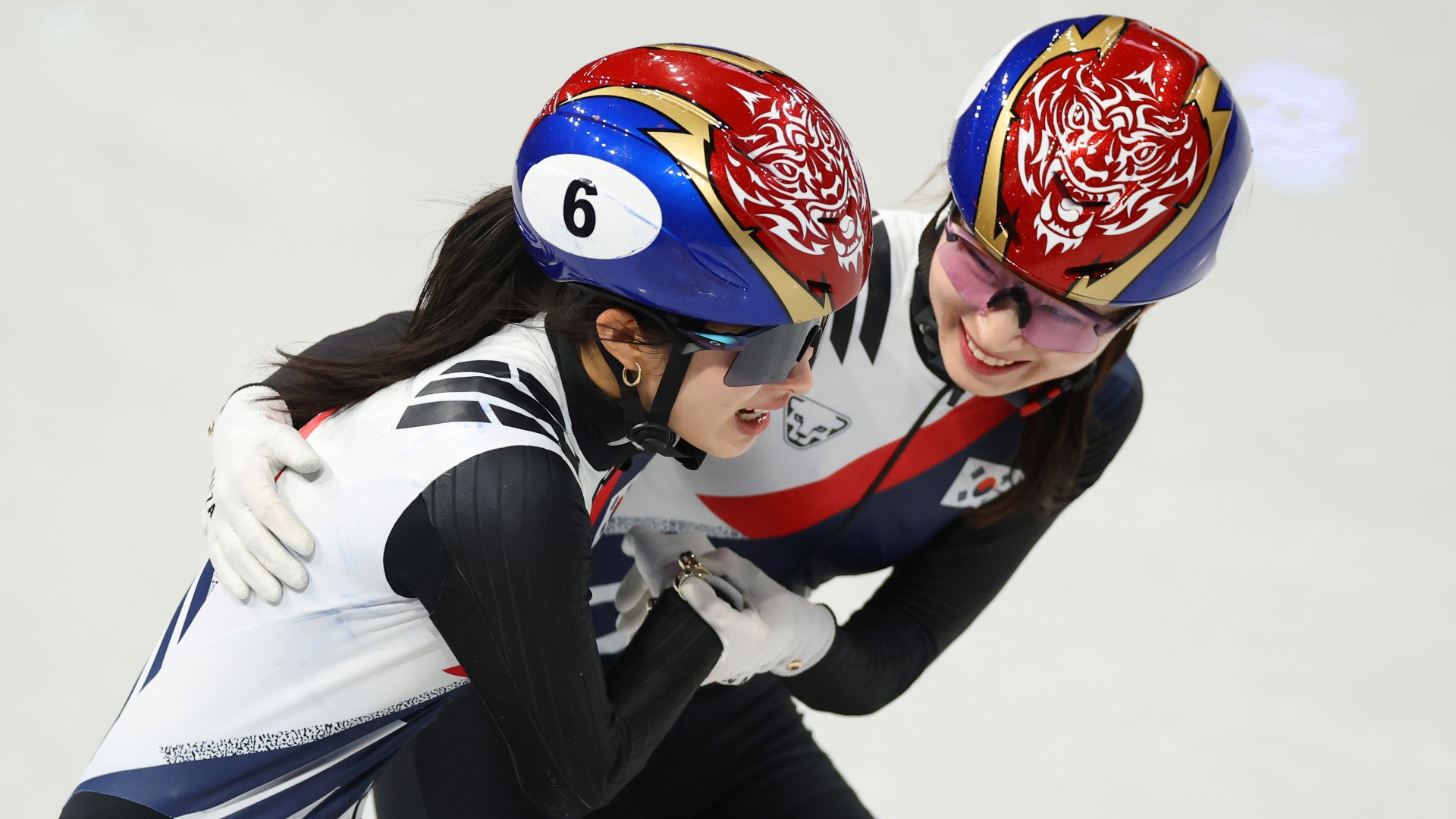South Korea's Kim Gil-li and Choi Min-jeong in Short Track Speed Skating action at the 2026 Winter Olympics