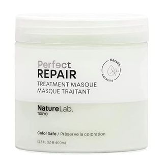 A closed, new jar of Naturelab Tokyo Perfect Repair Treatment Masque Jumbo Size: Heat and Color Protection, Hair Mask Treatment to Strengthen and Repair Dull, Damaged, Brittle Hair against a white background.