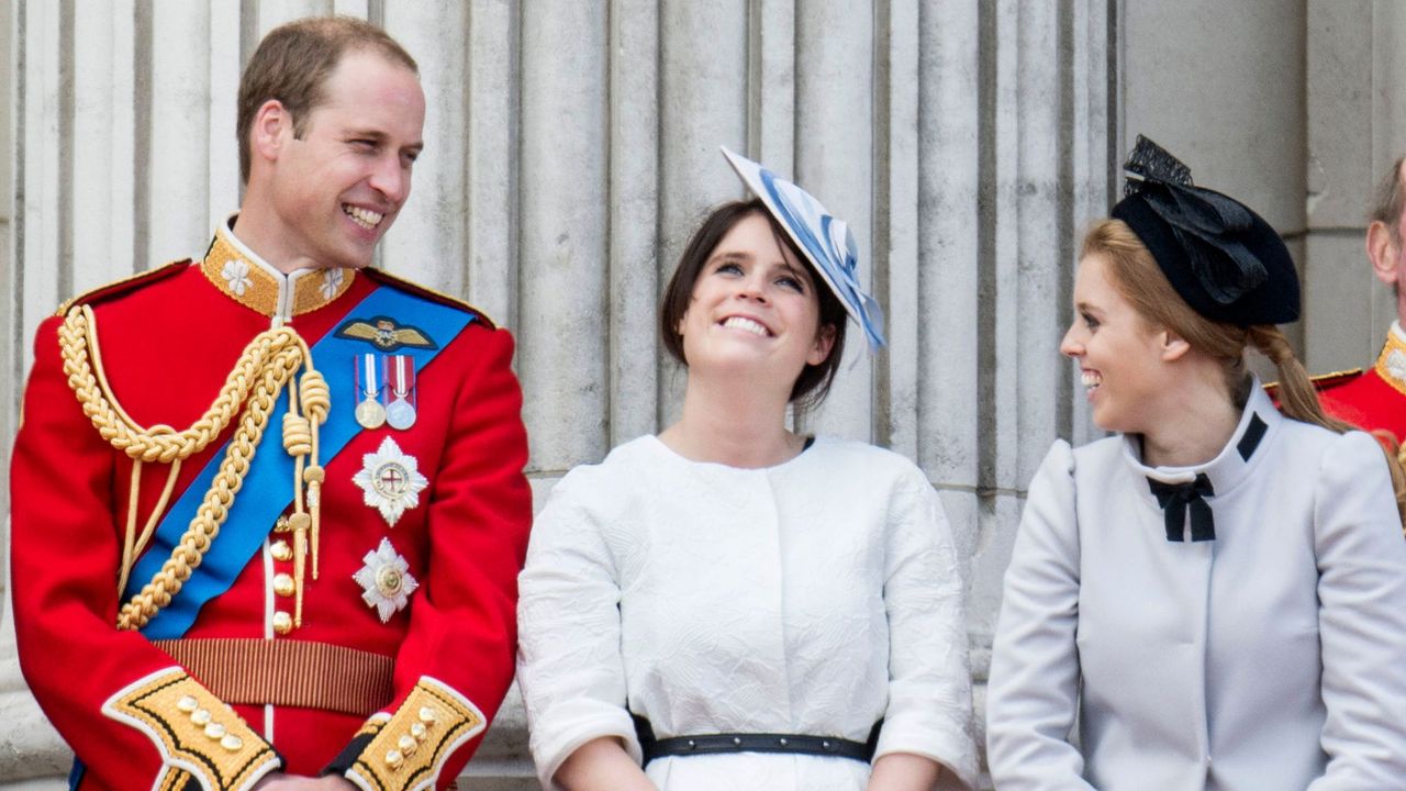 Prince William, Princess Eugenie and Princess Beatrice smile together on the Buckingham Palace balcony