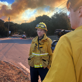 Photo of Lyndsey Lantz working as a firefighter on the frontline of the LA fire