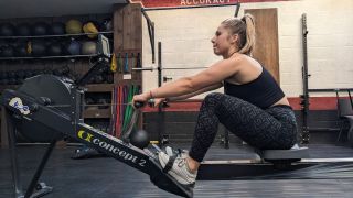 Emma Ray using the Concept2 rowing machine
