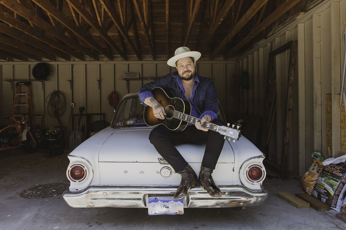 Nathaniel Rateliff with his new Gibson signature LG-2 Western acoustic guitar